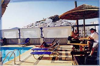 The pool with view of Ios town of the Pension Markos Village at Ios Island - Cyclades in Greece